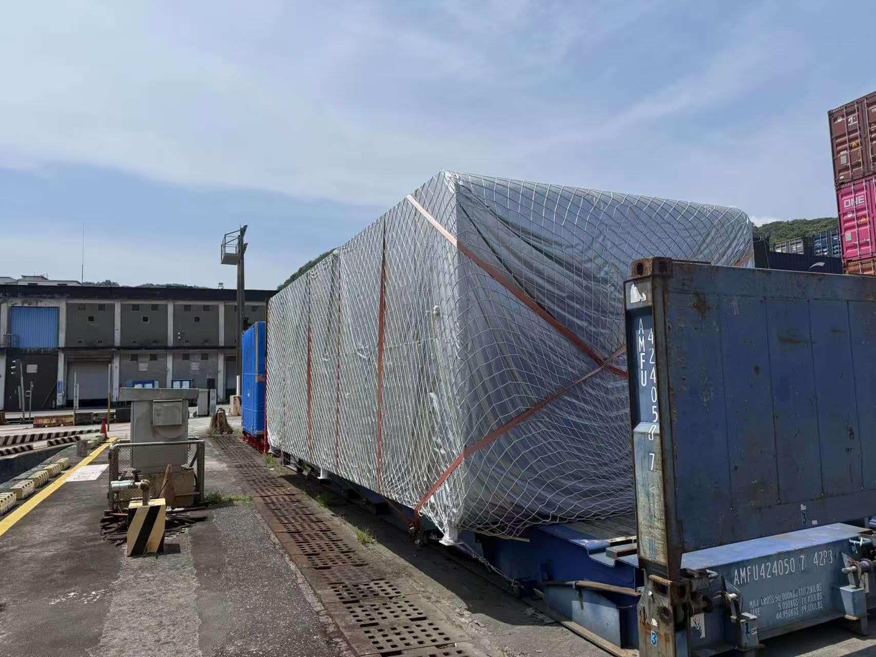 Another Apple Cabin Is On Its Way — Flat Rack Shipping for This Oversized Pod